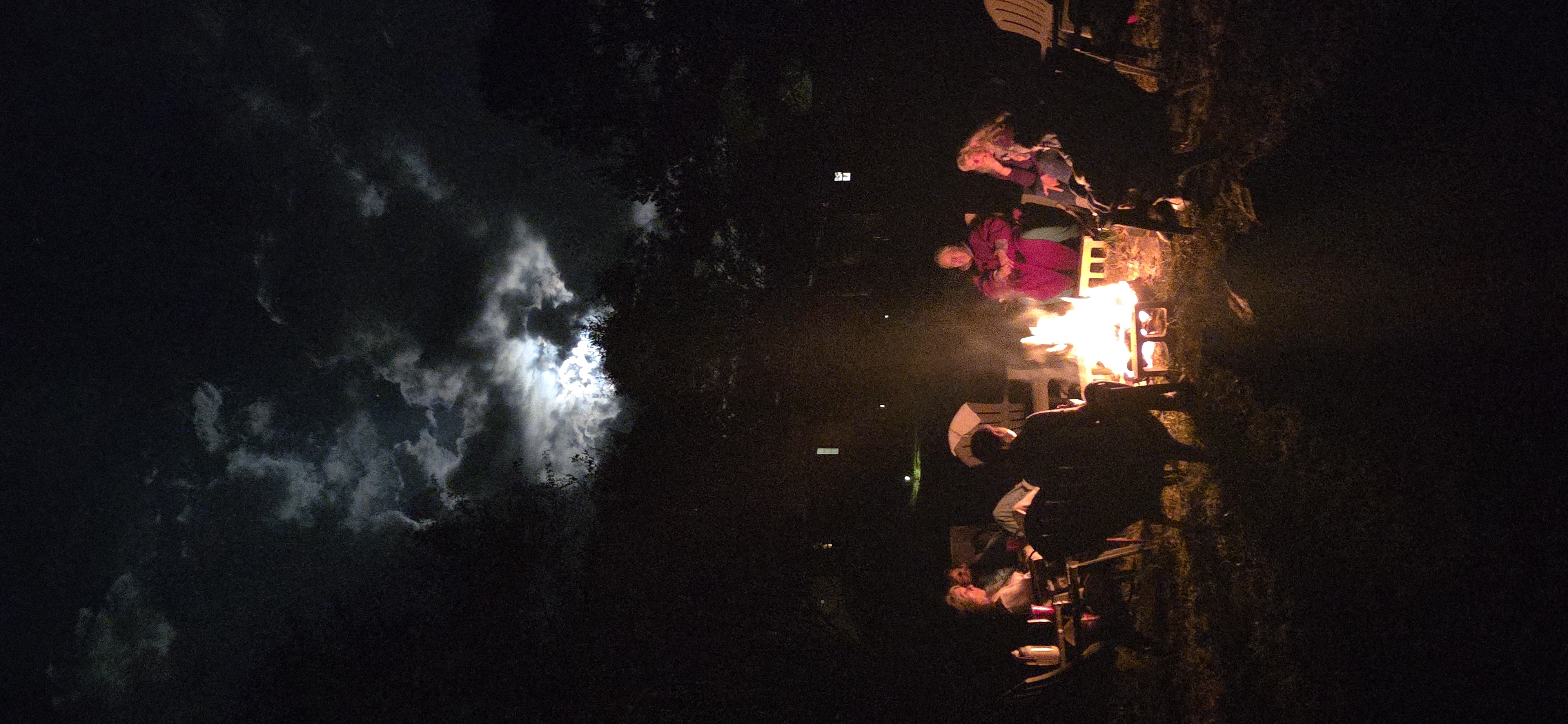 Fire circle under the moon at The Pearl