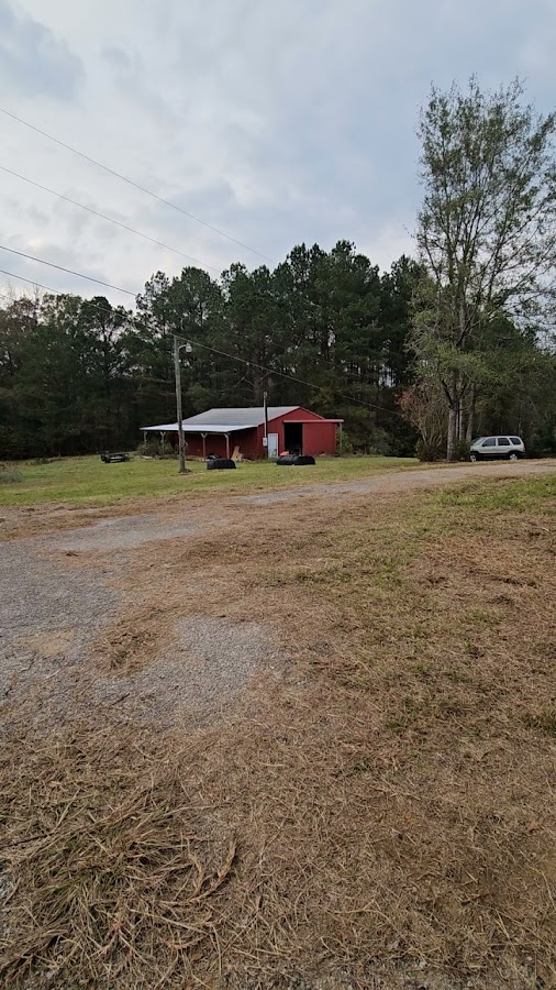 The red barn by the drive