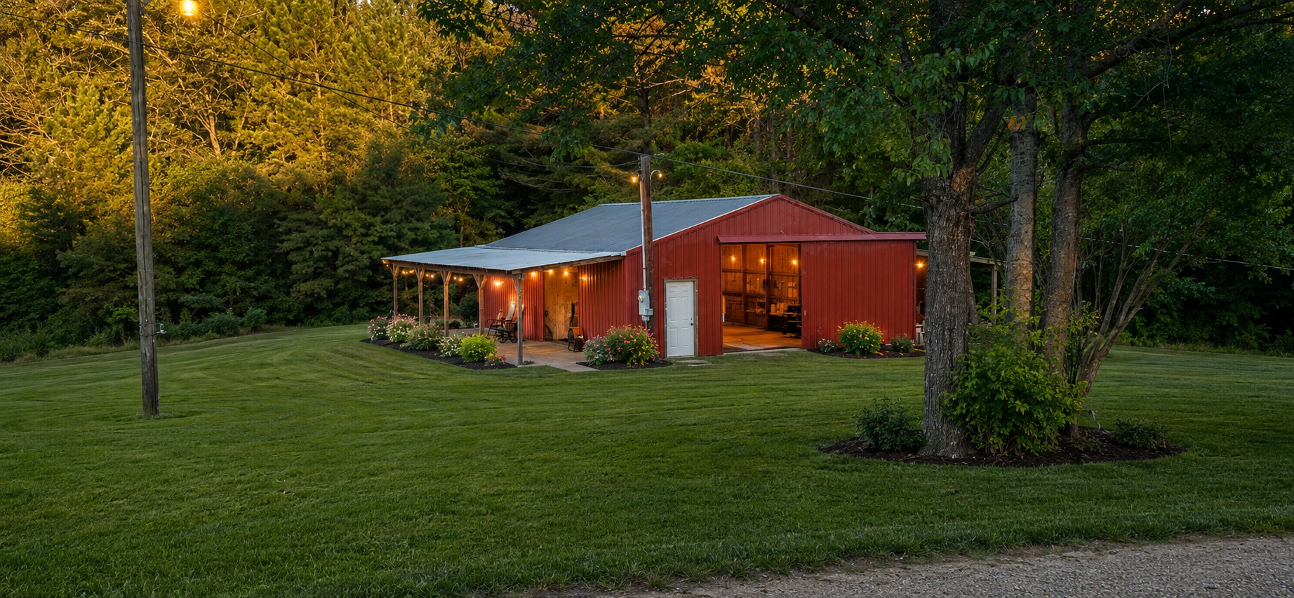 The red barn beside the trees at The Pearl