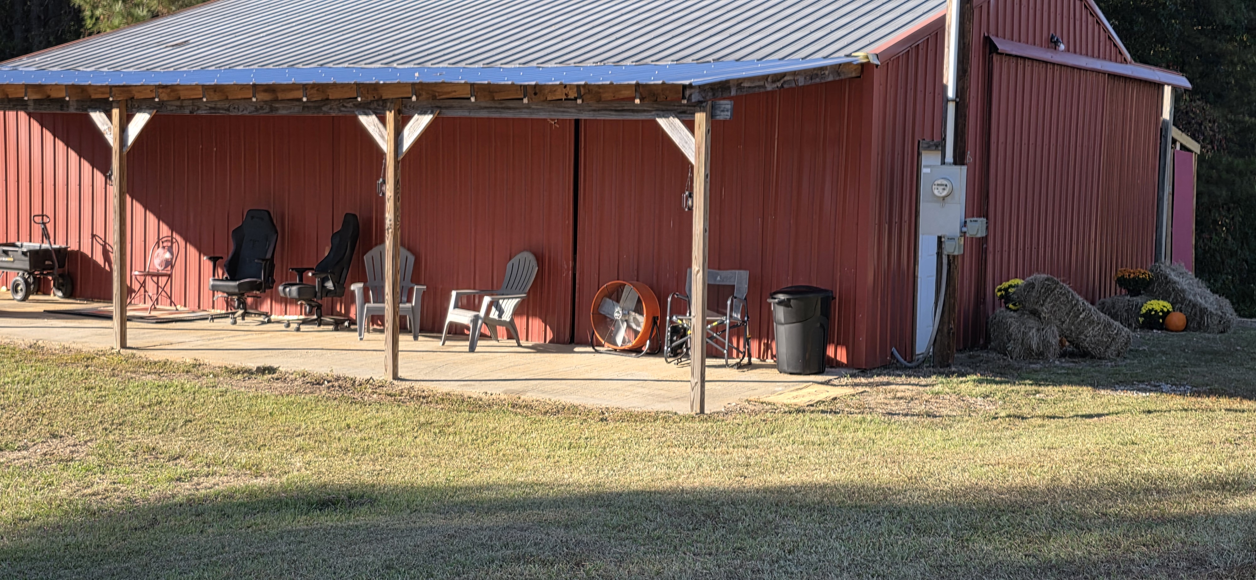 Close view of the red barn porch at The Pearl